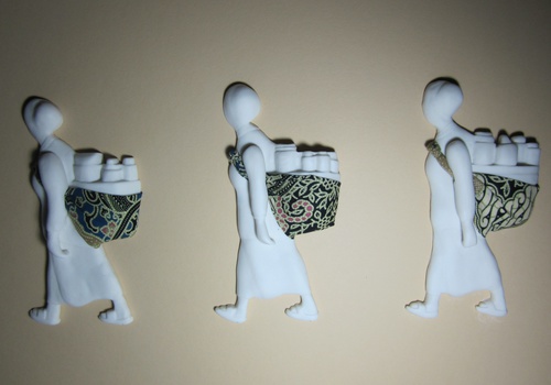 Mbok Jamu (Three Close Up); Southern Ice Porcelain, Batik; Unglazed; 5 Pieces On 38x82cm Frame; 2012