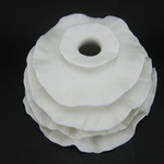 Wall Installation; Porcelain, Hand Built, Unglazed, Cone 10 Oxidation; 16x16x8cm; 2011