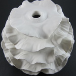 Wall Installation; Porcelain, Hand Built, Unglazed, Cone 10 Oxidation; 16x16x8cm; 2011