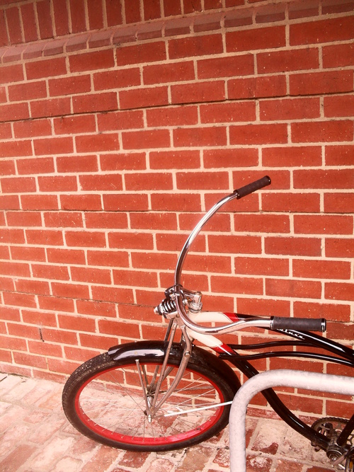 Bike Against Red Brick