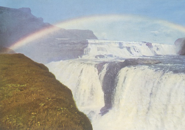 I Wonder How Close I Can Get To You Without Being Near You, 2013, Vintage Postcard, Contemporary Postcard And Artists’ Own C Type Photograph Of Gullfoss Waterfall, Blue Metal Rail Ballast, Metal Pole, Chain, Dimensions Variable, Edition Of 3 + Ap