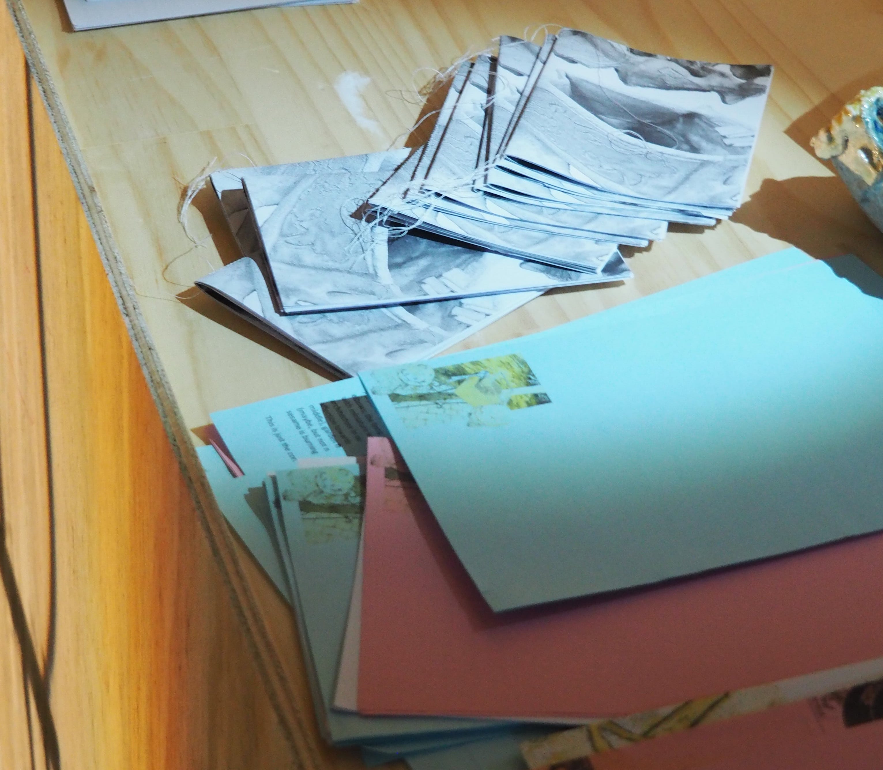 Recycled clay (unfired and fired), coloured slip, glaze, ceramic studio trolley, kiln props, kiln shelf, wood, found objects (from family home), zines; printer paper, printer ink, polyester thread, movie stills