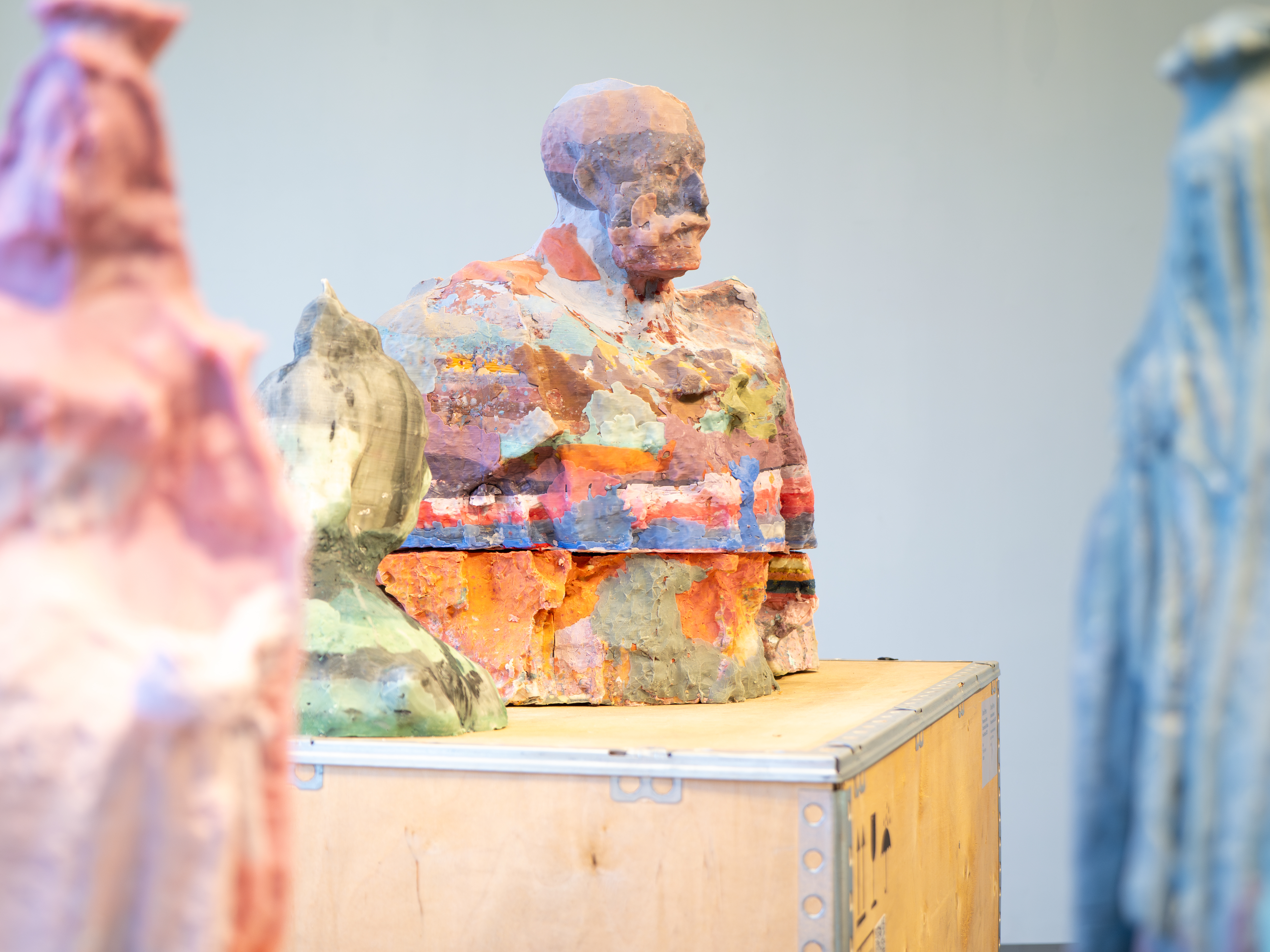 '‘Send-Off’ install shot', 2023. Wax mixed with oil paint on wooden transport crates. Photography by Richard Trang. Image courtesy of the artist.