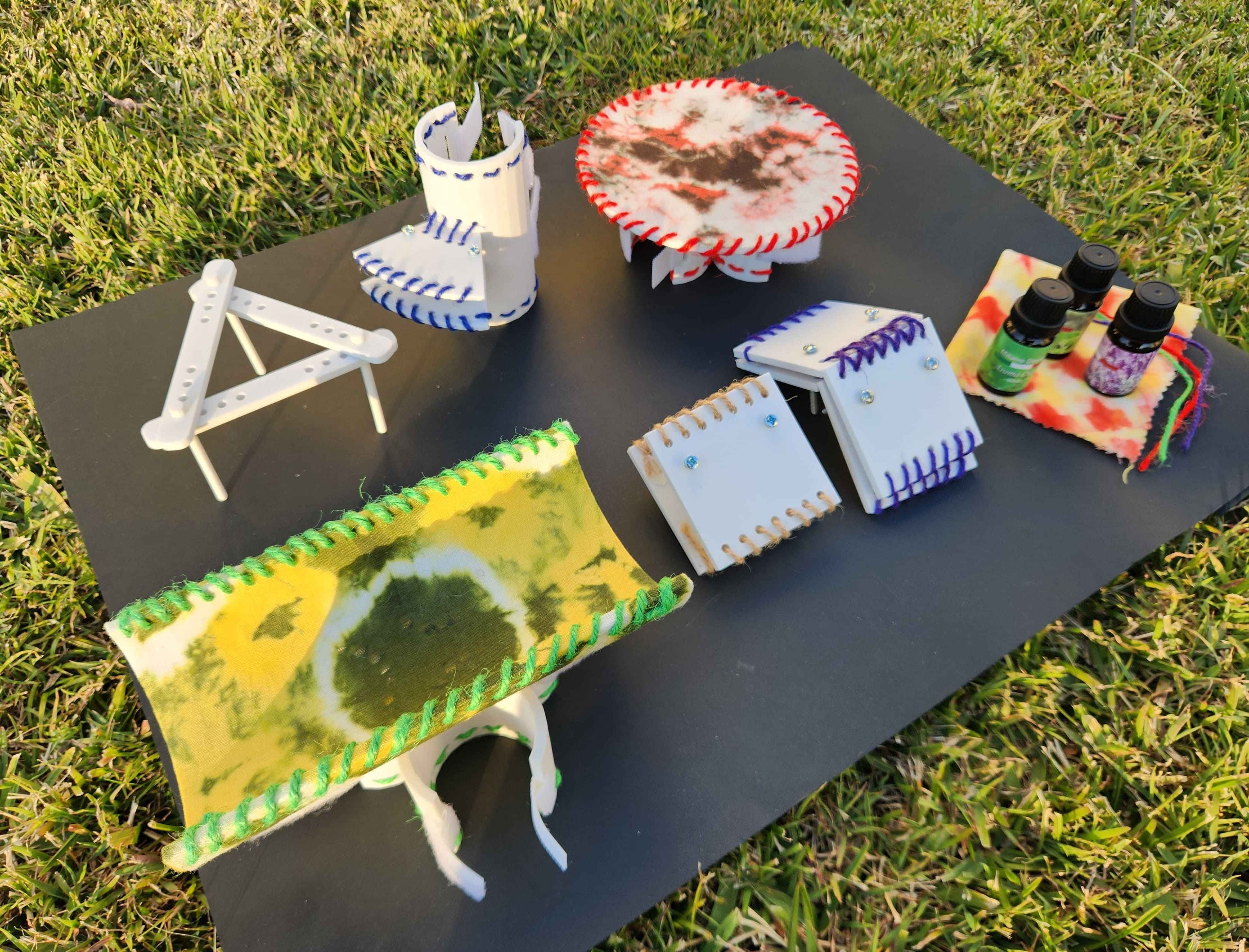 'DIY Joinery Kit', 2024. 3-D printing of plastic, tie and dye of fabric, colored jute ropes, infusion of smell in the joineries