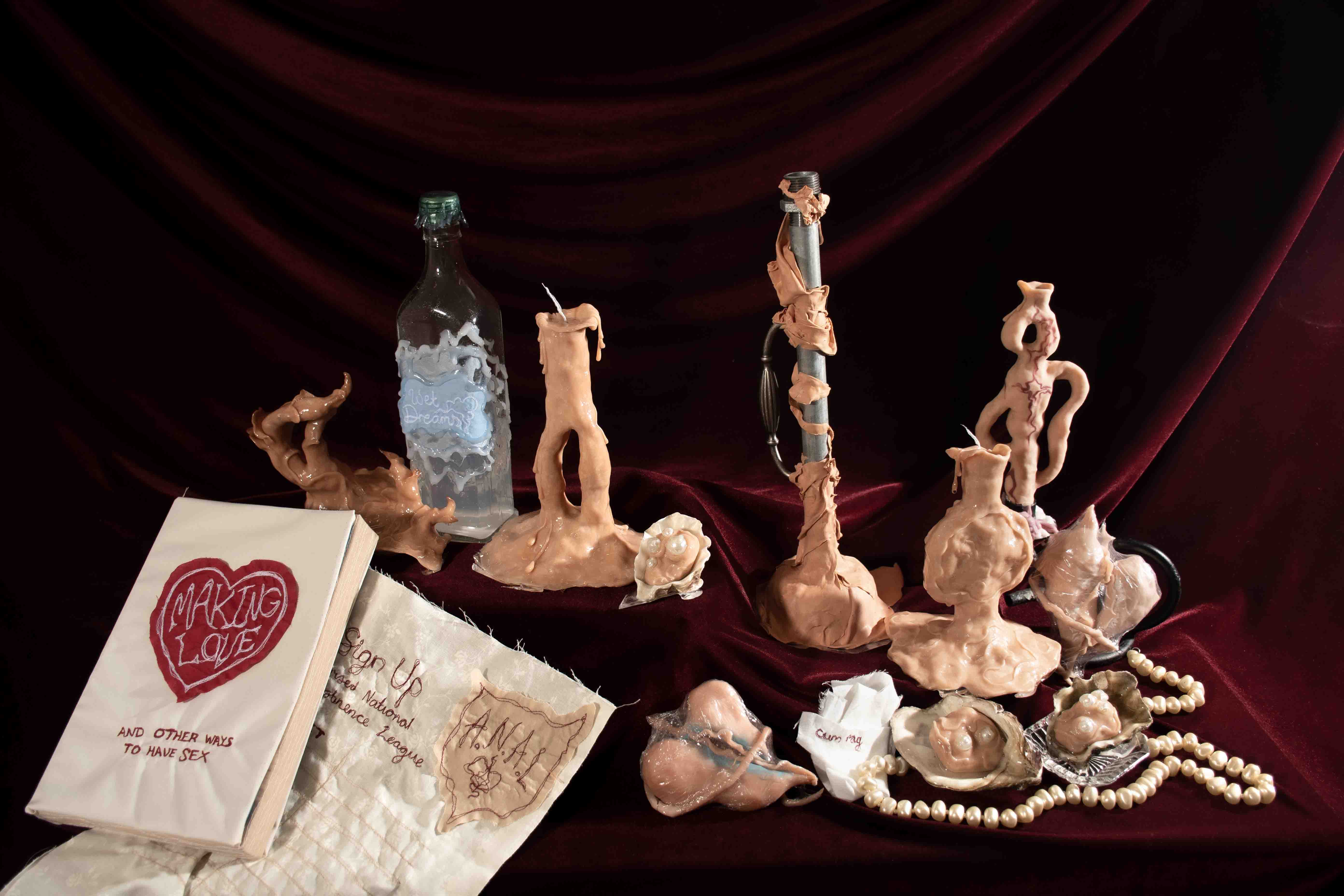 'Artefacts of Salacia', 2025. Assorted props, clay, glass, fabric, embroidery, pearls, oysters, plunger