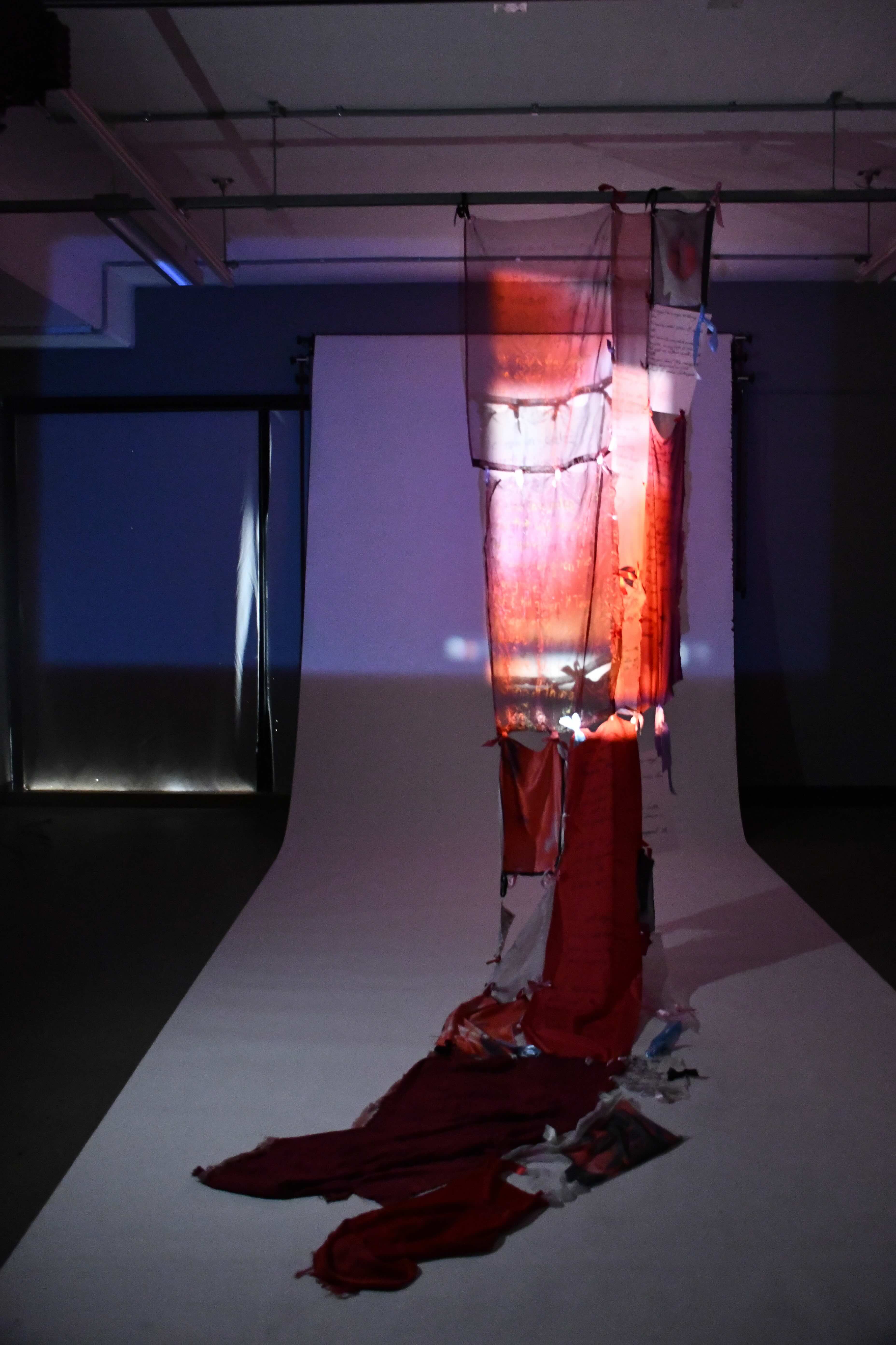 'Embouchure', 2025. Mixed textile, digital projection