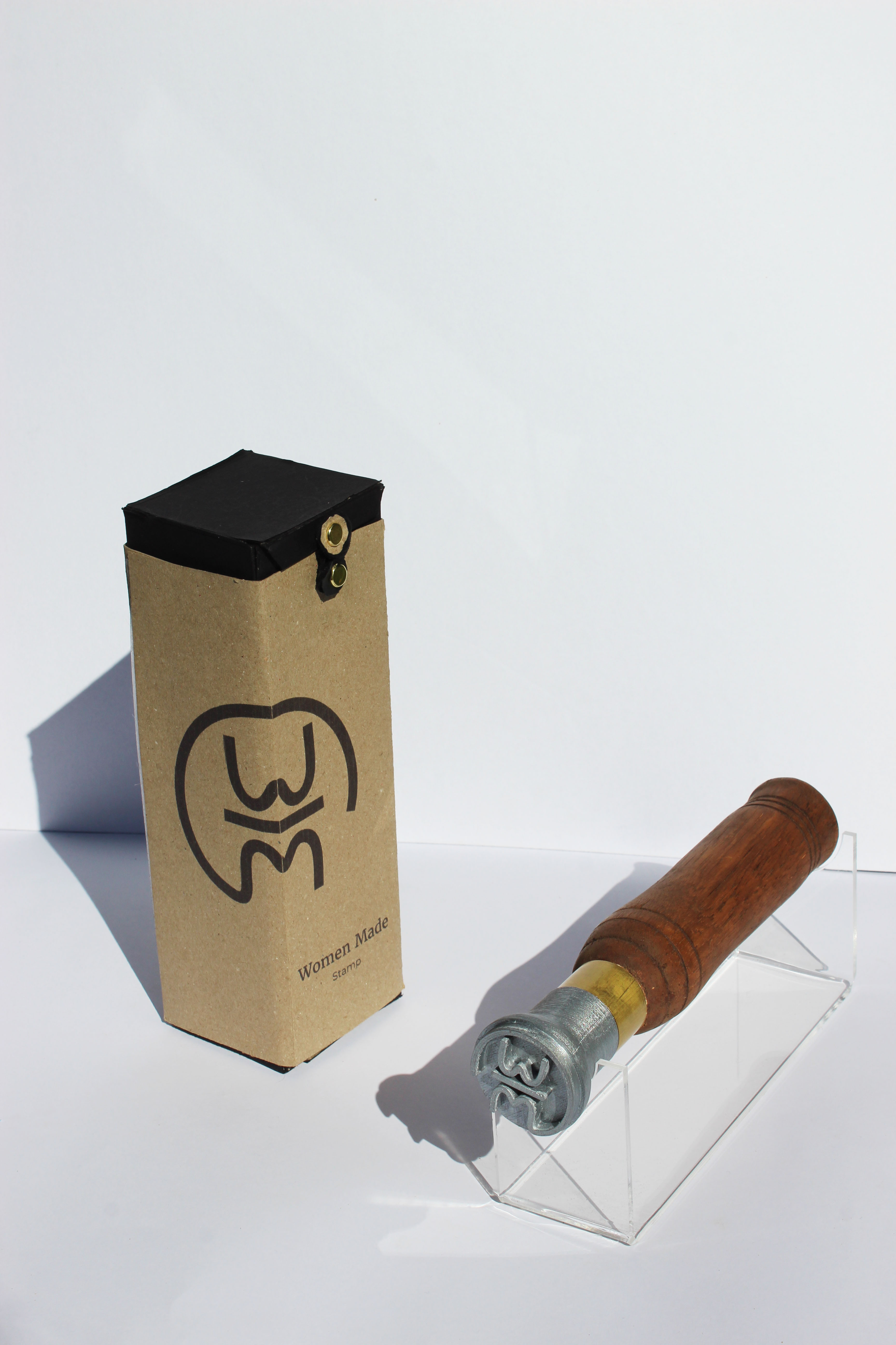 'Women Made', 2025. Glacial oak, PLA, brass, acrylic stand, Enviroboard packaging
