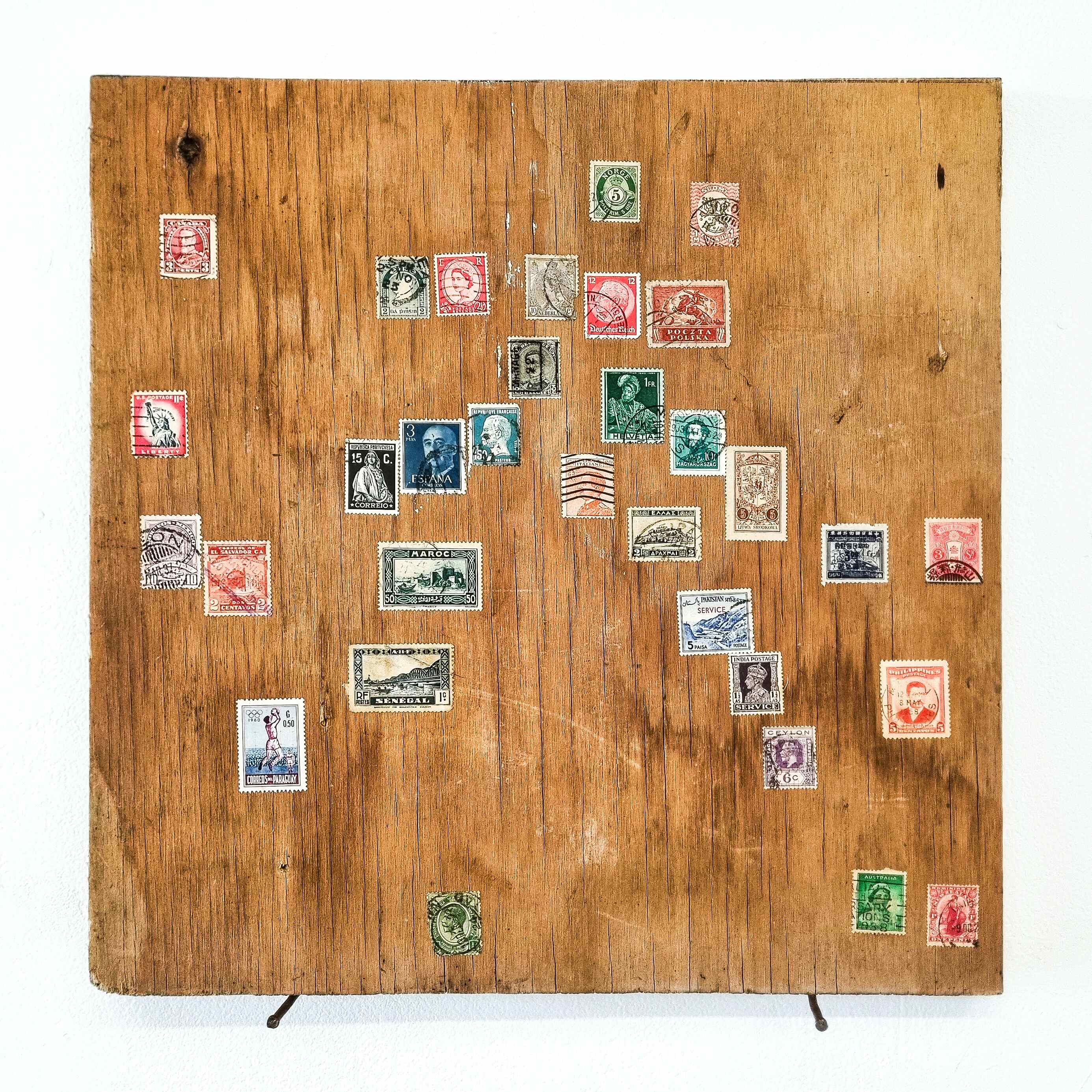 'Untitled (Map)', 2025. Plywood, stamps
