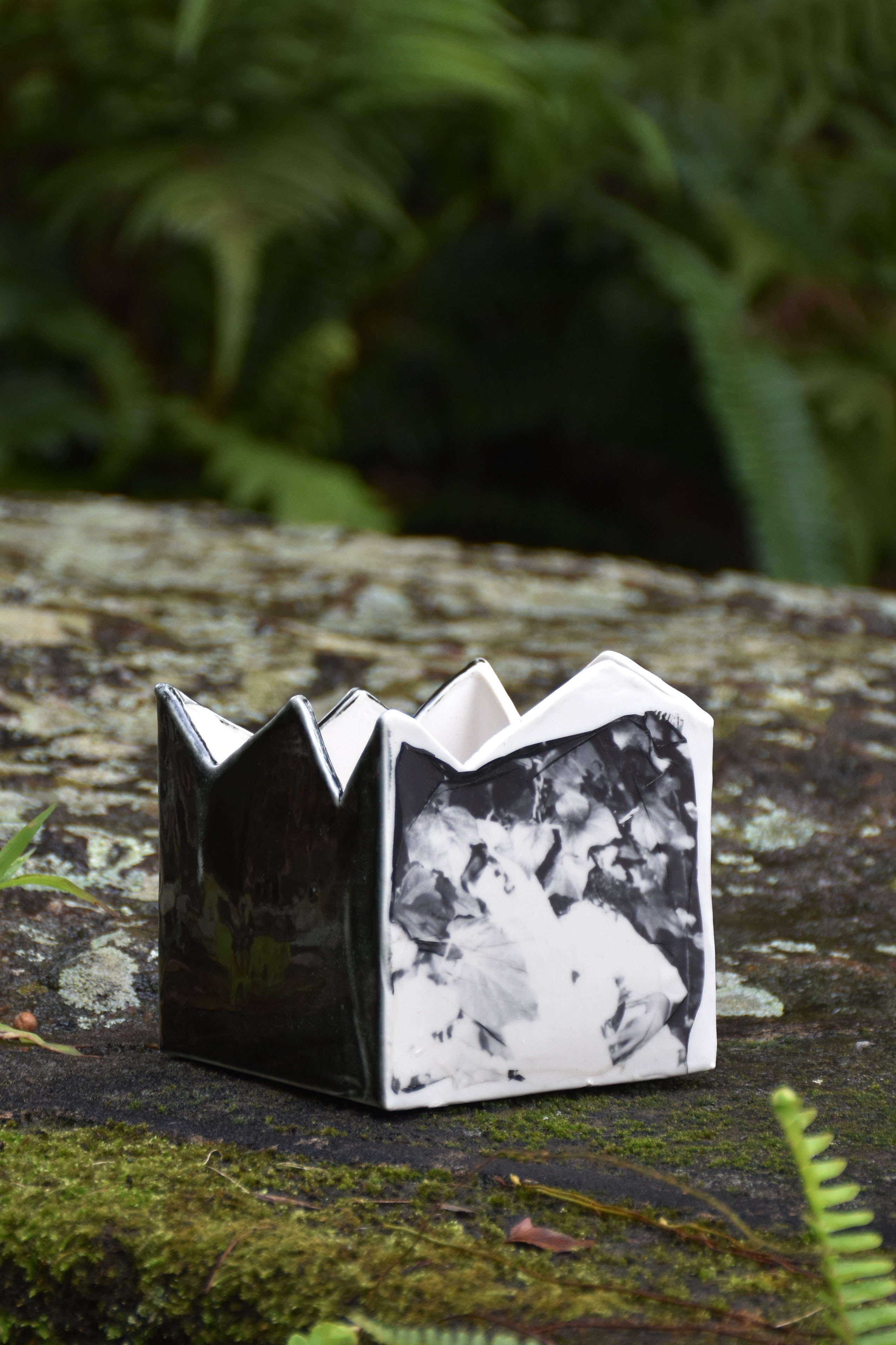 'Tender Eden', 2025. Polaroid emulsion and ceramic