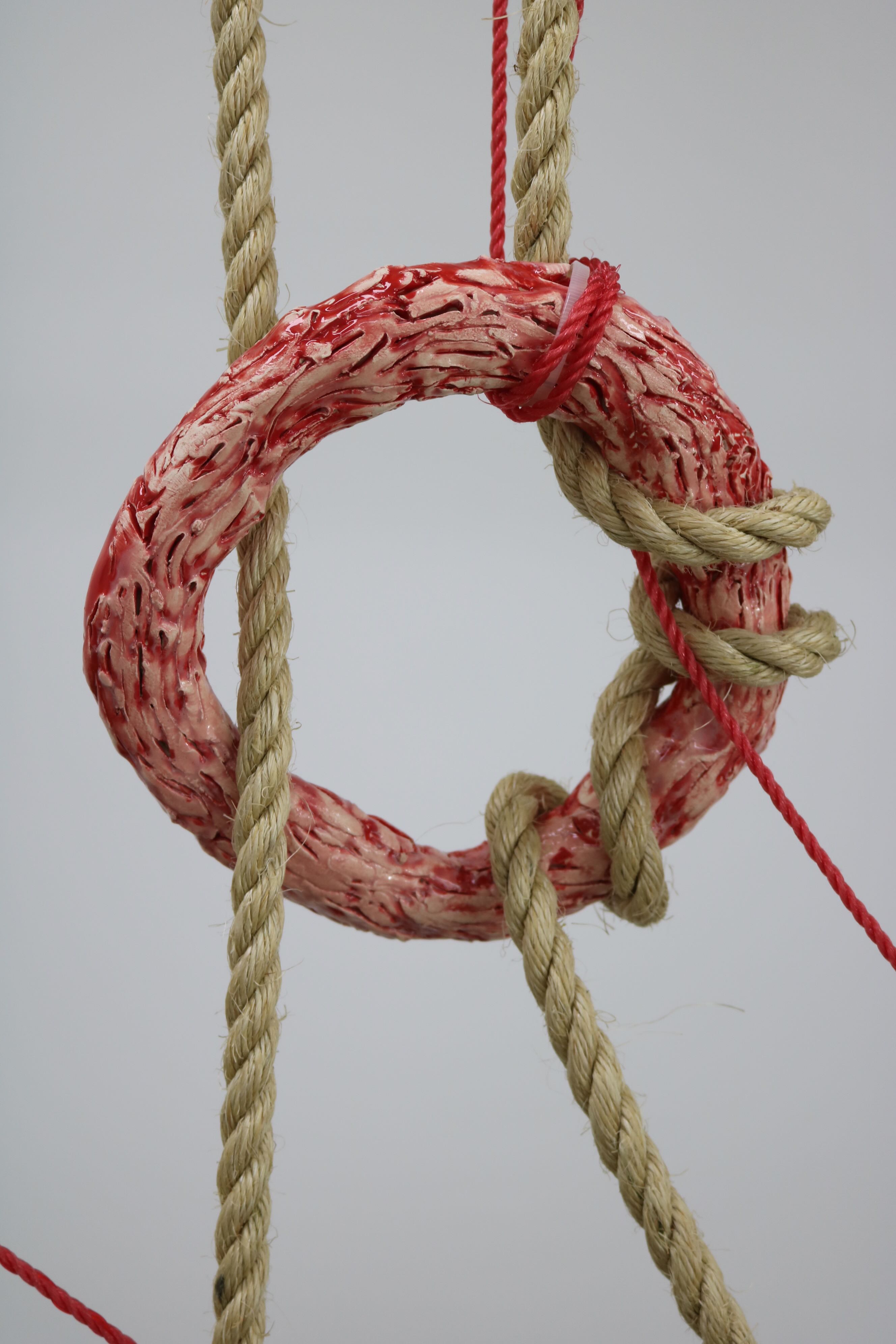 'Fleshscape', 2025. Glazed earthenware, rope, timber