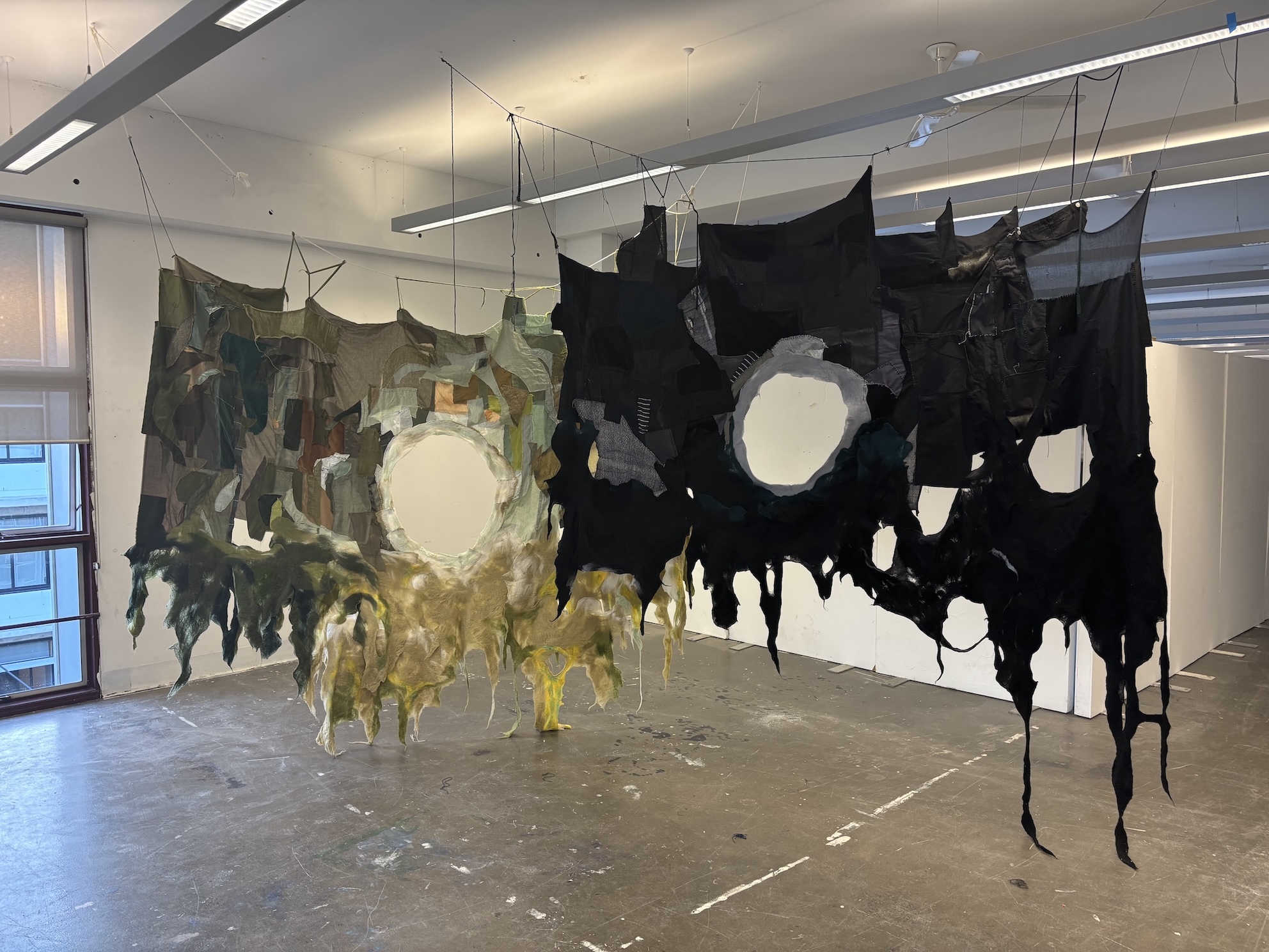 'the green (body), the black (body)', 2025. Wet wool felting and textile patchwork 