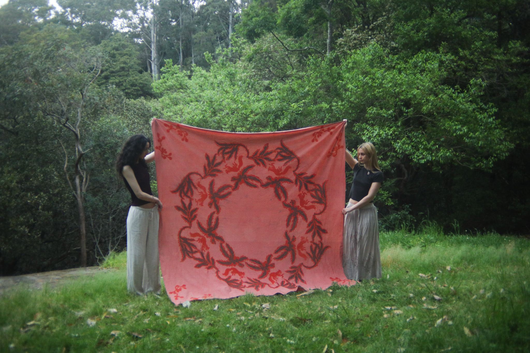 'Dyeing for the earth: Rituals for safe passage', 2025. Calico, naturally dyed with madder