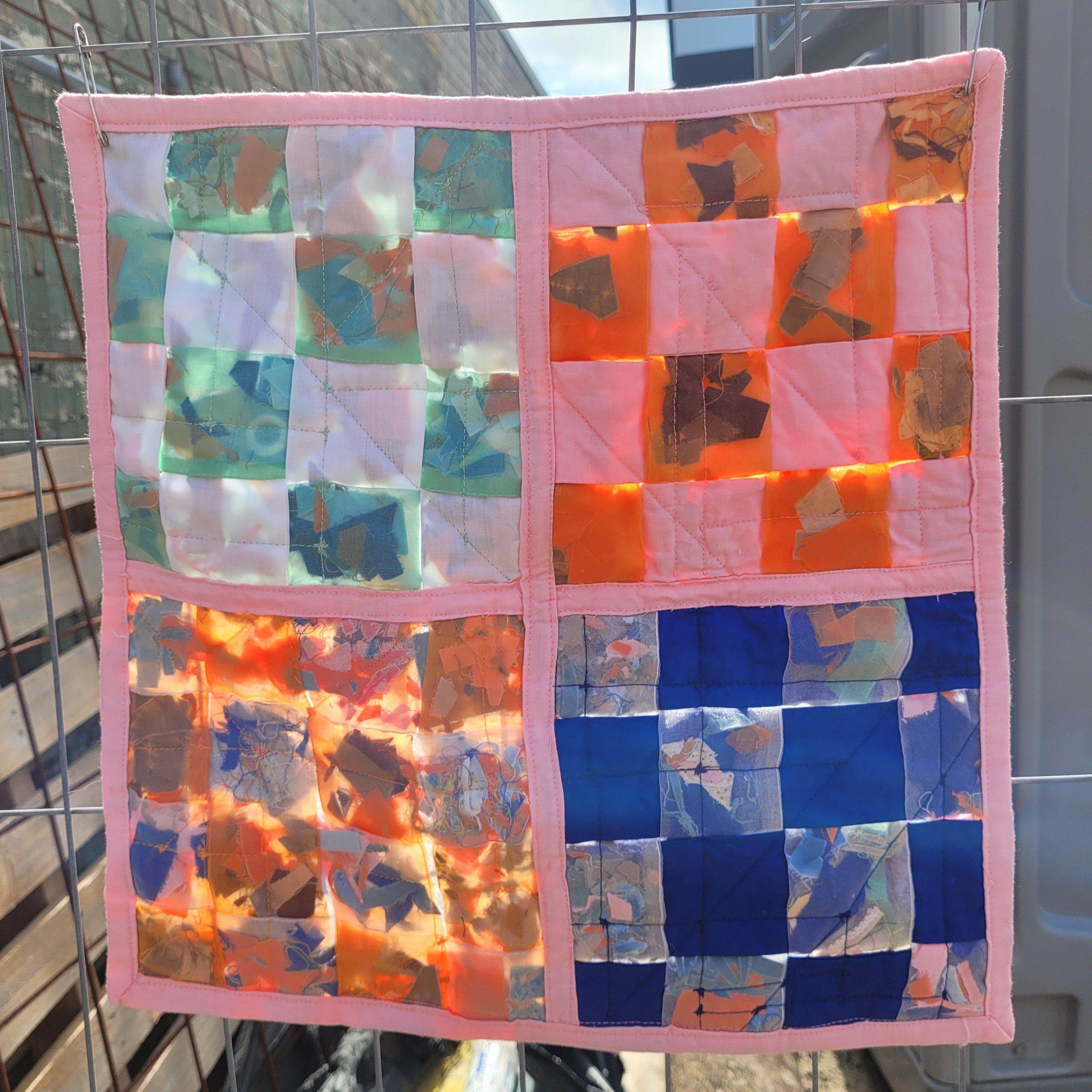 'Urban Rust: Silk Memories', 2024. Woven cotton and silk quilt 