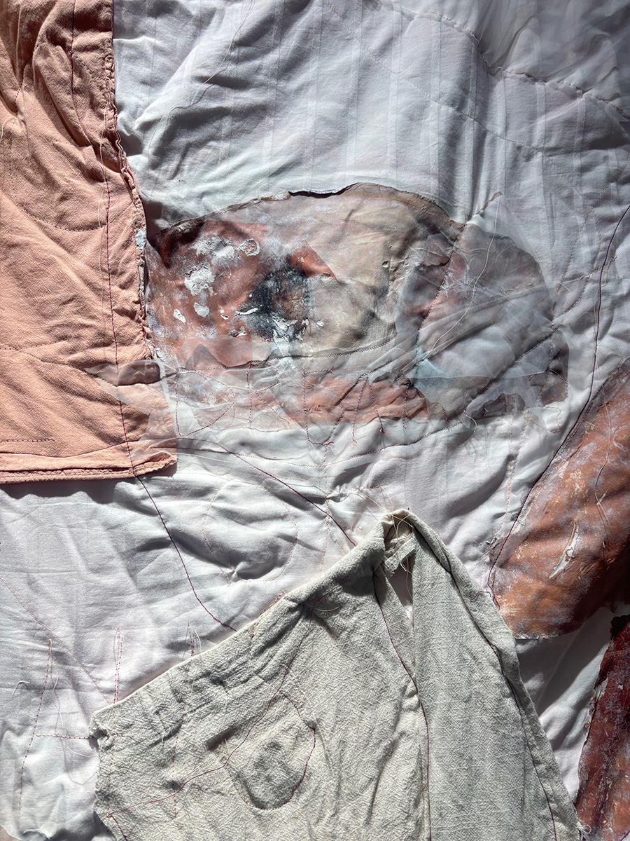 'Dreaming of this', 2025. Found fabrics, eucalyptus oil, acrylic medium, thread, sewing needles, chord and earthenware ceramics
