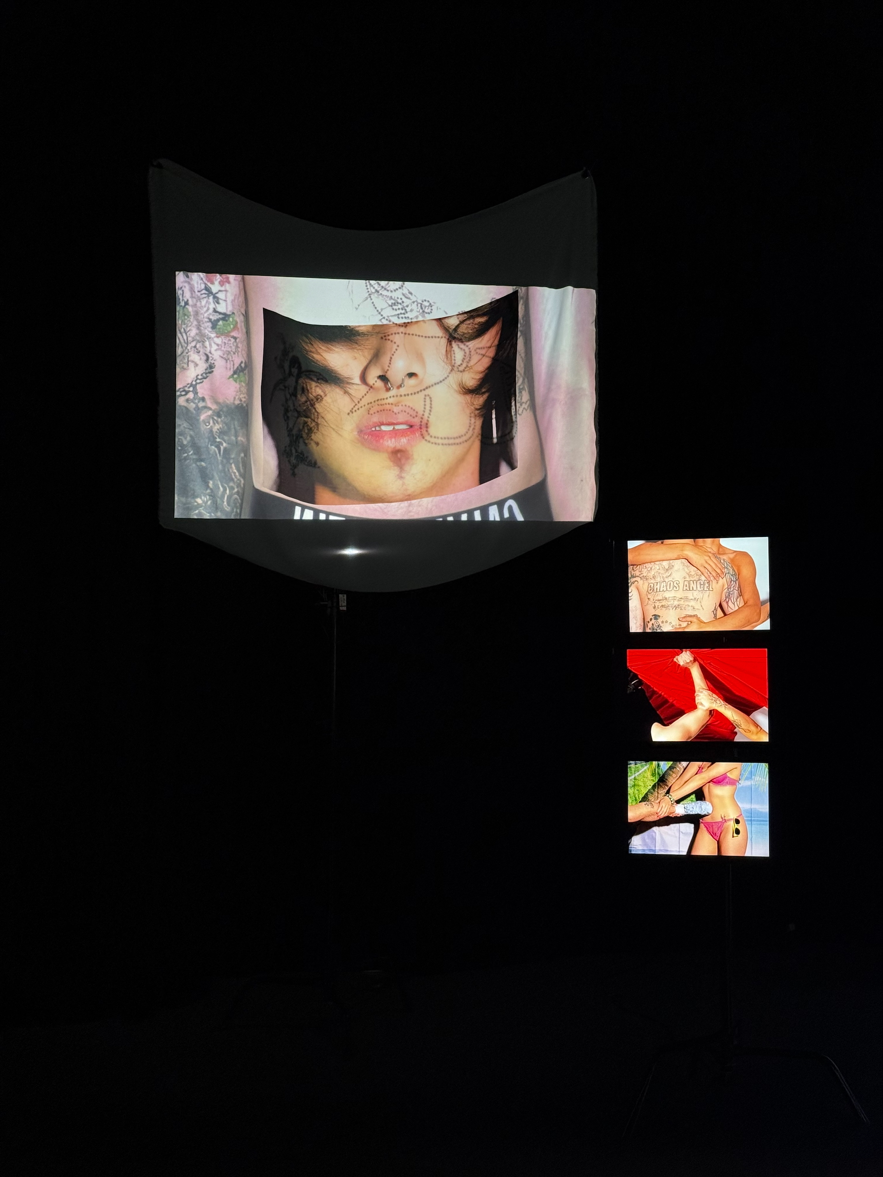 'An Unsigned Diary', 2025. Textile, three digital photographs, 3-minute video