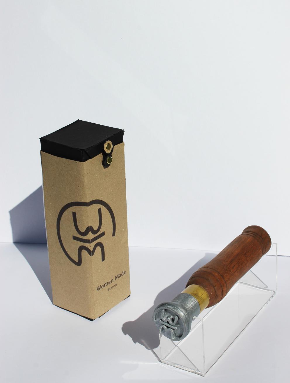 'Women Made', 2025. Glacial oak, PLA, brass, acrylic stand, Enviroboard packaging
