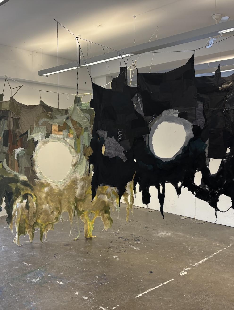 'the green (body), the black (body)', 2025. Wet wool felting and textile patchwork 