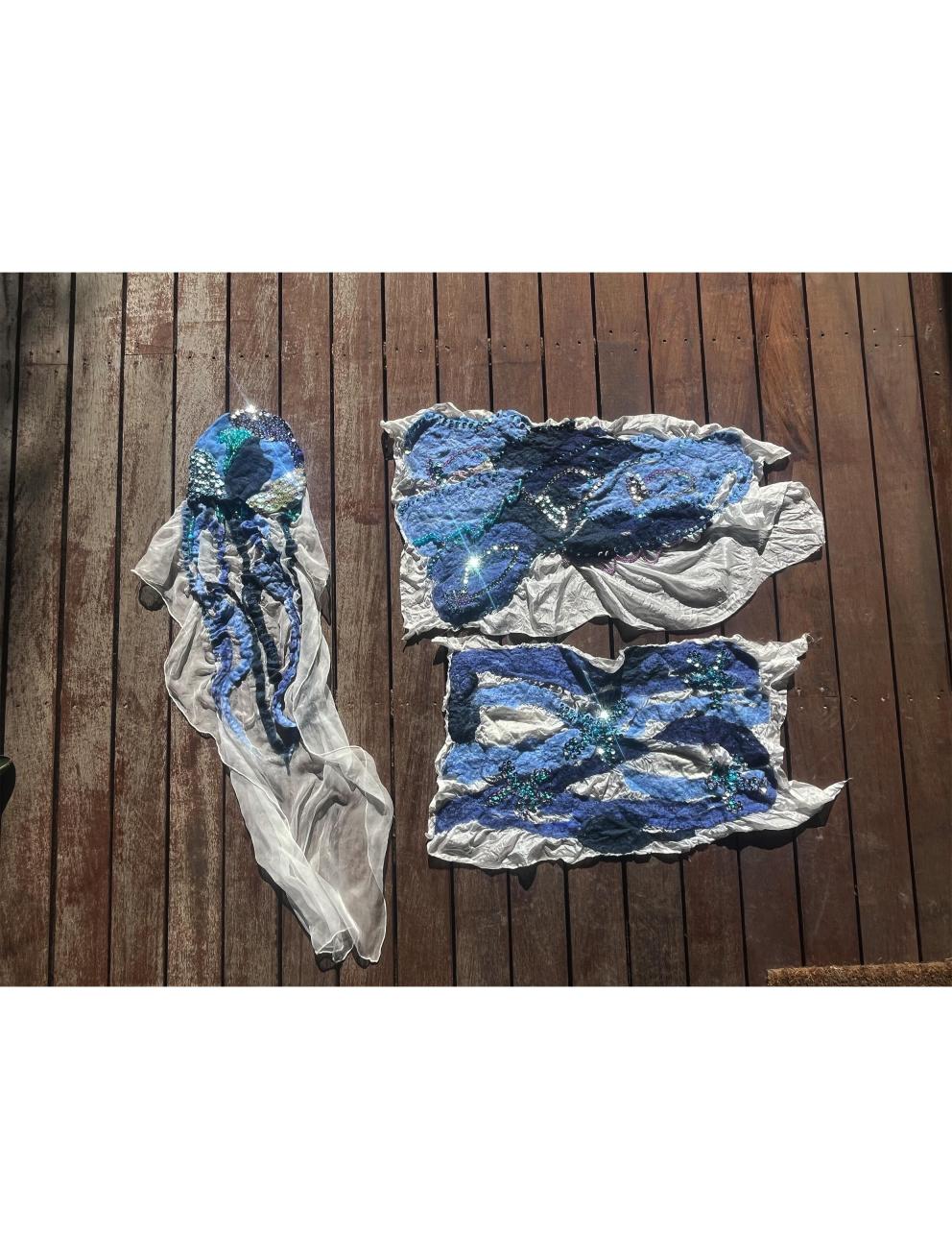 'Five minutes at the deep blue', 2025. Recycled wool, white silk, second hand sequins and thread