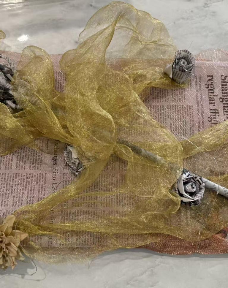 'Echoed Voice', 2025. Metal, newspaper, metal mesh, cardboard