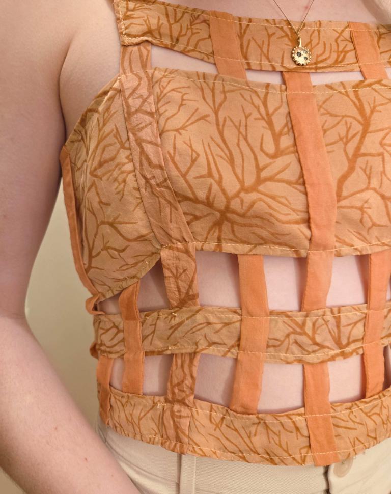 'Silk-Cycle', 2025. Silk blouse with mordant print repeat pattern